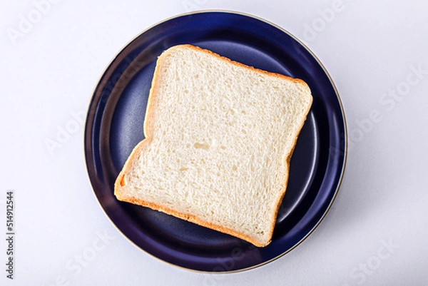 Obraz 青いお皿に食パン