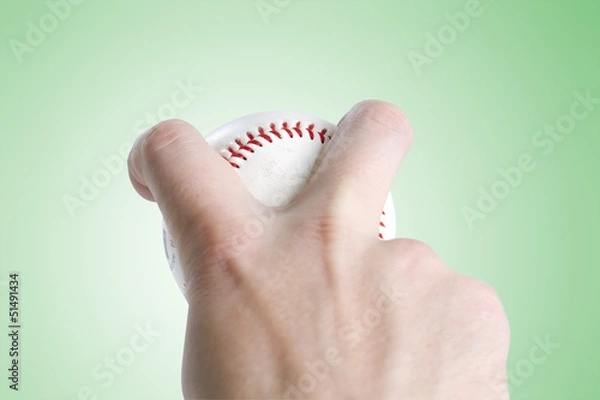 Fototapeta split finger baseball grip on green with clipping path