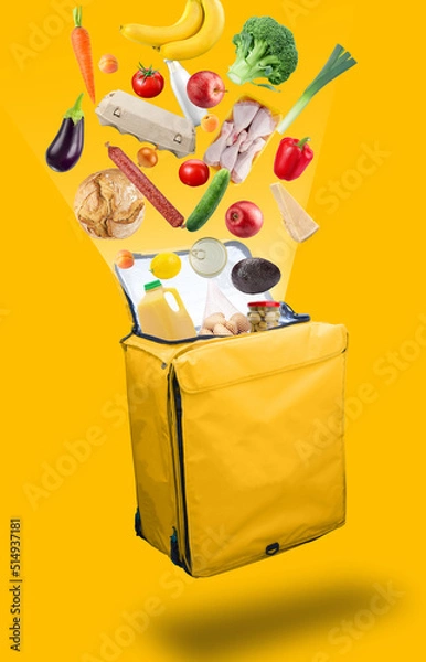 Obraz Vegetables, products that flying out of a open yellow courier food delivery bag, isolated on a yellow background. Fresh food delivery concept.