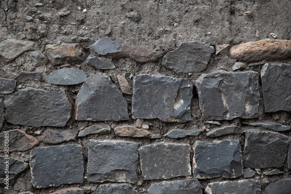 Obraz Black rock stone wall background, pattern or texture