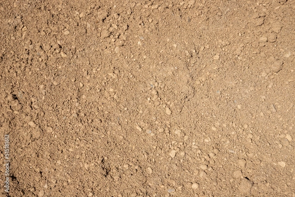 Fototapeta texture of gravel stones on ground on ground background	