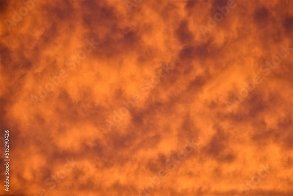 Fototapeta オレンジ色に染まる夕暮れの空と雲