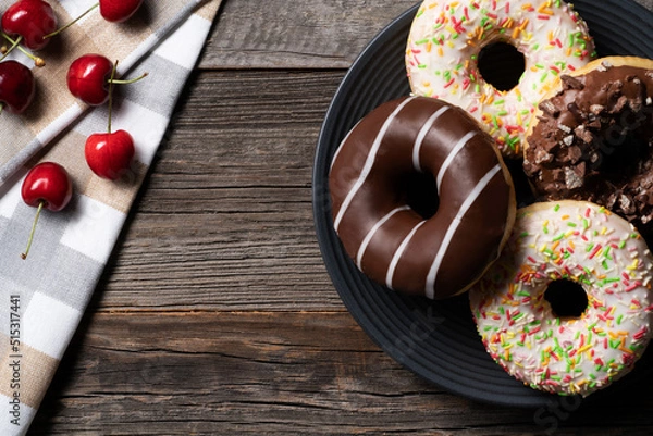 Obraz Freshly baked glazed donuts