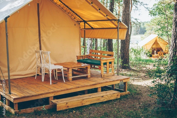 Fototapeta Path to glamping tent with view on woods. Camping and outdoor concept. Rest at nature