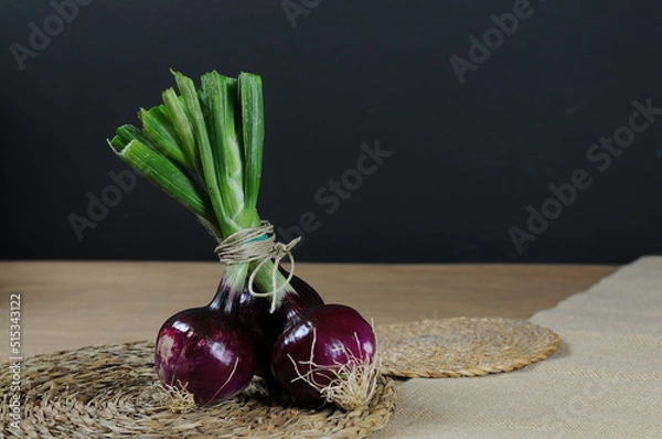 Obraz red onions on table