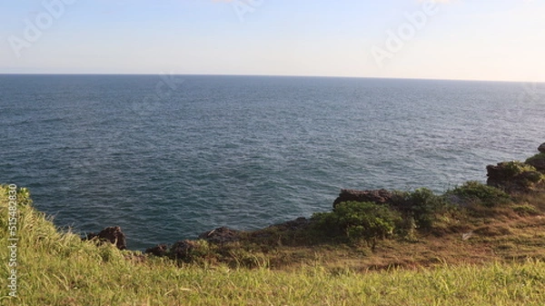 Obraz person walking on a cliff