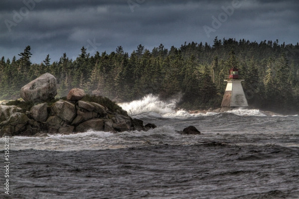 Fototapeta lighthouse with hurricane waves