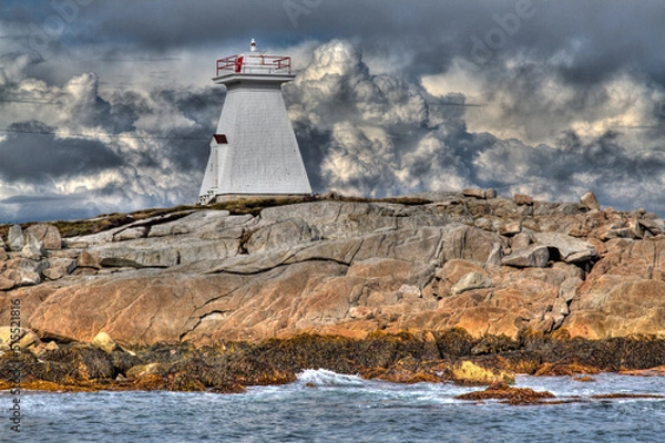 Fototapeta lighthouse with dramatic clouds