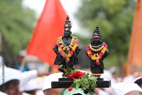Fototapeta Warkari Carrying Vitthal Rukmin Statue on head in Wari to Pandharpur