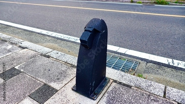 Obraz 長崎県壱岐市郷ノ浦にあるゴリラを模した車止め