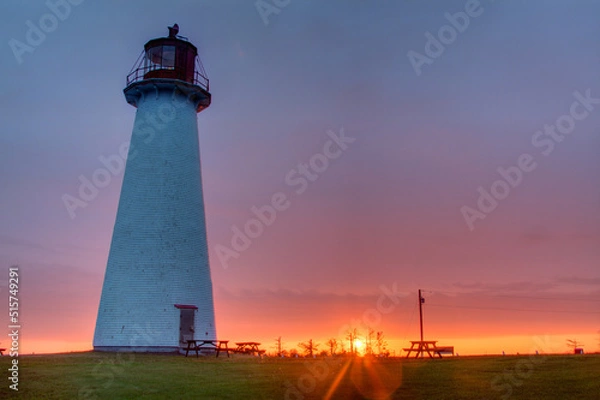 Obraz round lighthouse with purple sunset