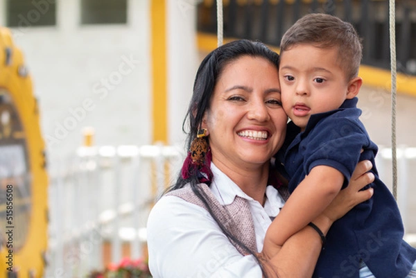 Obraz Portrait of a child with Dawn syndrome and his mother. Concept of inclusivity and diversity.