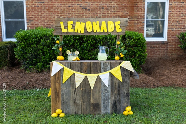 Fototapeta An empty lemonade stand ready for children to start selling lemonade on a hot summer day as their first business endeavor