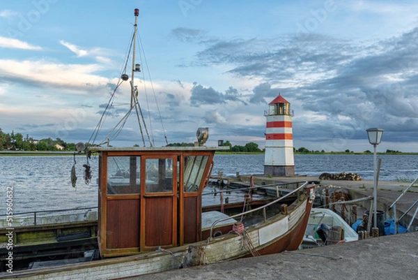Obraz Fischkutter und Leuchtturm auf der Insel Ummanz