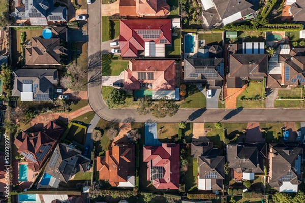 Obraz Top down early morning aerial view in winter of a neighbourhood street corner in outer suburban Sydney, Australia.