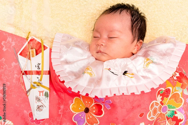 Obraz お宮参りの着物を着てすやすや眠る赤ちゃん