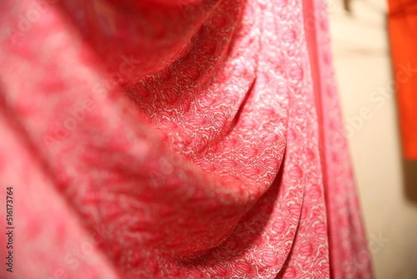 Fototapeta Isolated shots of freeze motion of red satin.