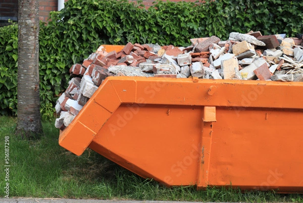 Fototapeta Bricks in a Garbage Dumpster