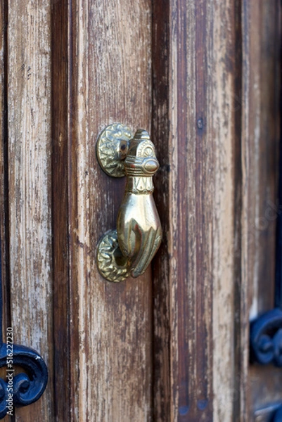 Obraz Old door with iron knocker