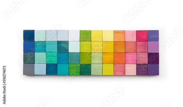 Fototapeta Colors of creation. Mosaic of colored wooden blocks isolated on white, abstract. Color selection, color concept background. Arrangement or spectrum of colored wooden blocks.