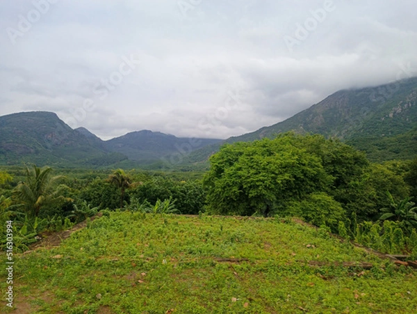 Fototapeta Mountain covered by cloud and it's wide view.