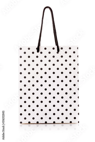 Obraz White package for shopping or gifts with black dots and handles.