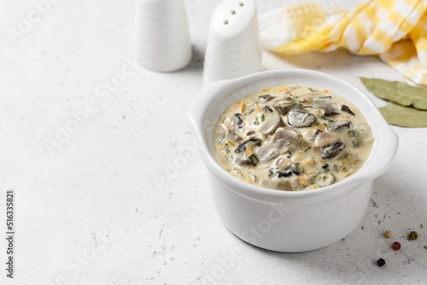 Fototapeta Creamy vegetable mushroom sauce in pot. Top view, copy space.