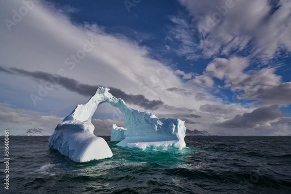 Obraz Antartic sea iceber with arch shape