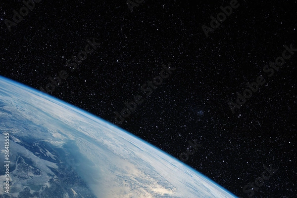 Fototapeta The earth from space in a star field. Elements of this image furnished by NASA.