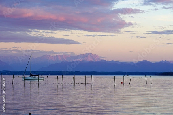 Fototapeta sunset on lake starnberg with the alps in background 2022