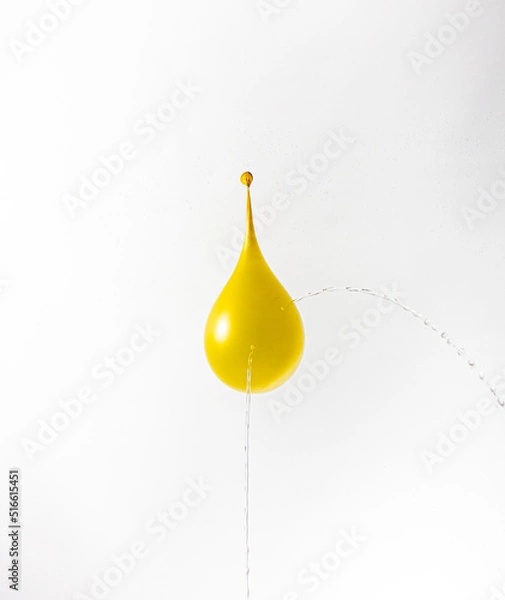 Obraz punctured water balloon leaking