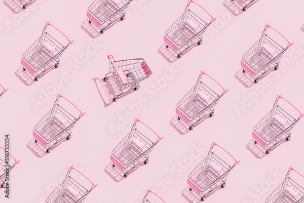 Fototapeta Pattern of supermarket shopping cart on pastel blue background. Creative design for packaging. Online shopping pattern. Black friday sale concept. Break the pattern. Sustainable, minimalist lifestyle.