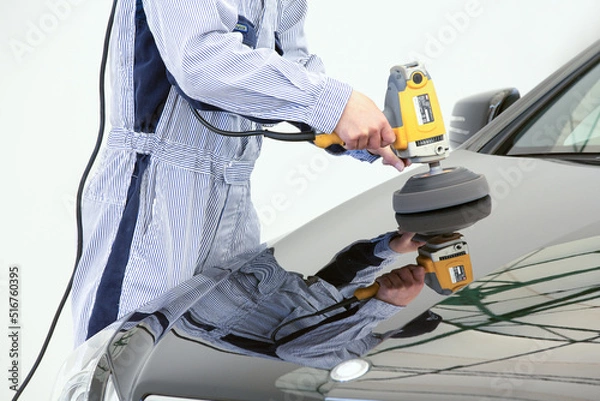 Fototapeta mechanic working on a car