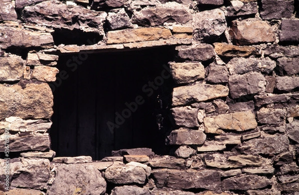 Obraz old stone wall with window