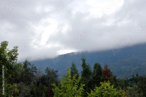 Fototapeta clouds over the mountains