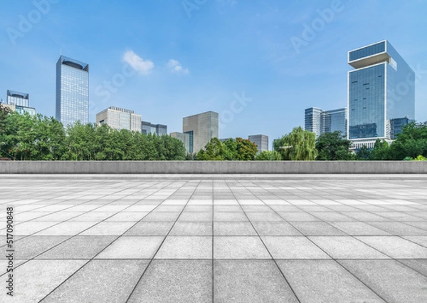Fototapeta empty pavement and modern buildings in city