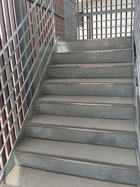 Obraz ビルによくある鉄製の非常階段の景色