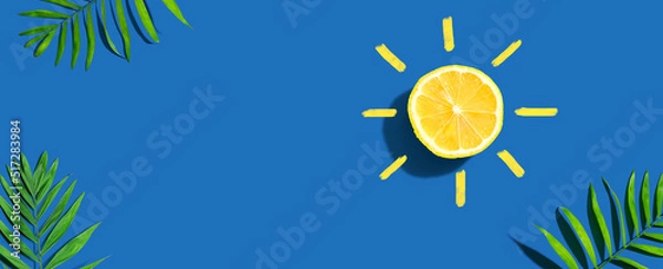 Fototapeta Summer concept with lemon sunlight with palm leaves