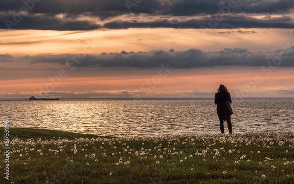 Obraz Gorgeous, dramatic sunset over water