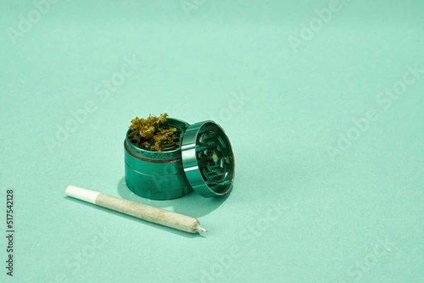 Obraz Jar with marijuana buds and cannabis rolled joint