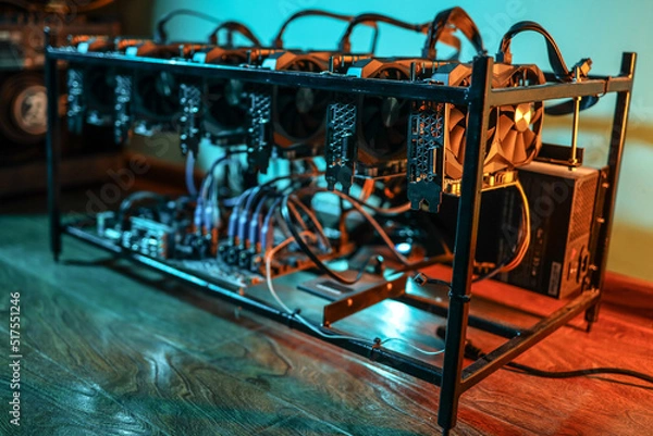 Fototapeta Cryptocurrency mining rig with computer graphics