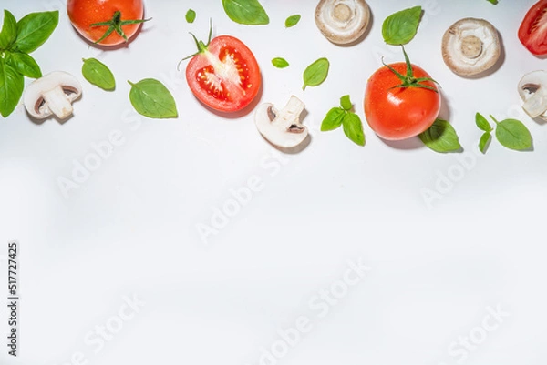 Fototapeta Mushrooms, tomato and basil isolated on white. Flatlay pattern on white background top view