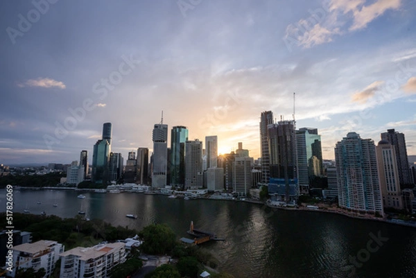 Obraz Brisbane city skyline viewed from the top of Story Bridge at sunset with glowing river and urban skyscrapers