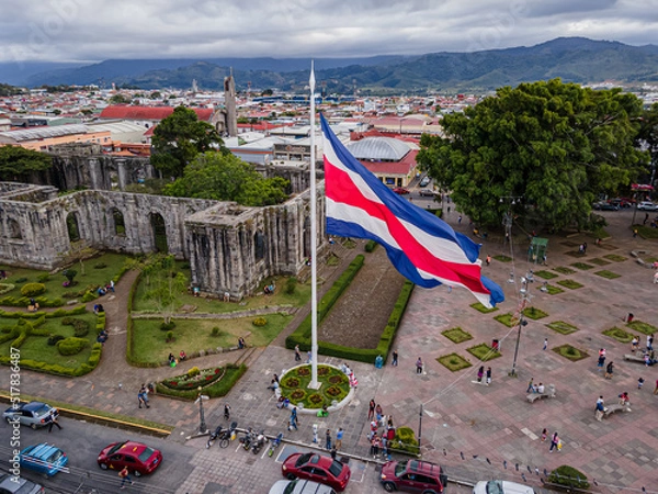 Fototapeta Beautiful view the Costa Rica Flag waving dramatically in the sky