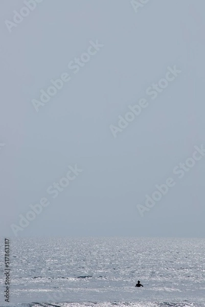 Obraz surfer in the waves