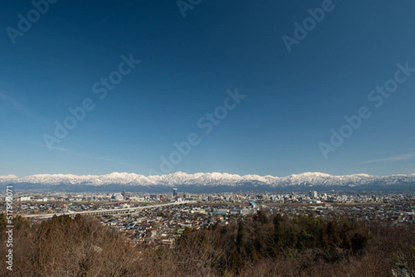 Fototapeta 富山市と立山連峰（呉羽山展望台から）