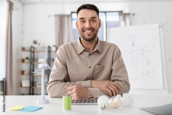 Fototapeta distance education, school and remote job concept - happy smiling male teacher having online class or video call at home office