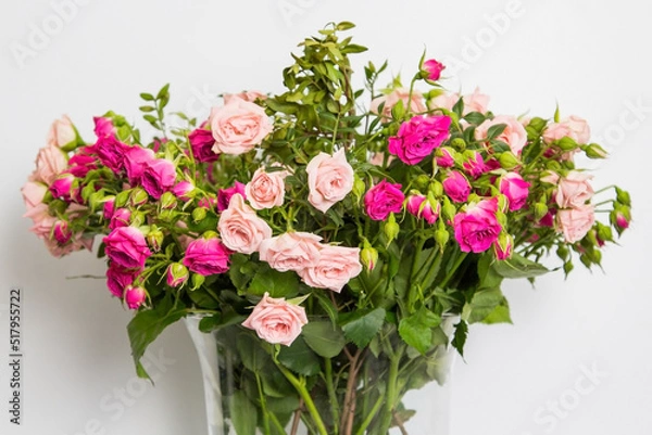 Fototapeta Wilted bouquet of flowers isolated on a white background