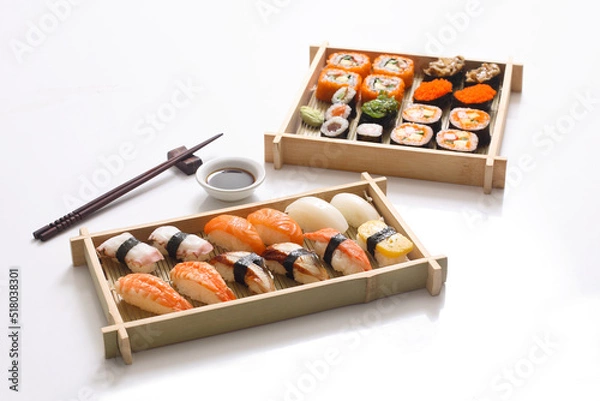 Obraz sushi set and sushi roll on wooden board