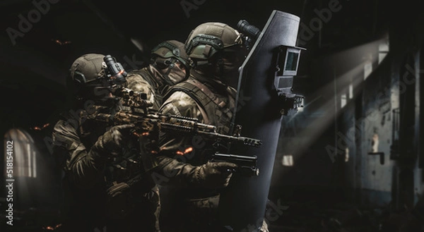 Obraz Armed group of special forces against the background of a destroyed building. The concept of game simulators. SWAT group. Antiterrorism.